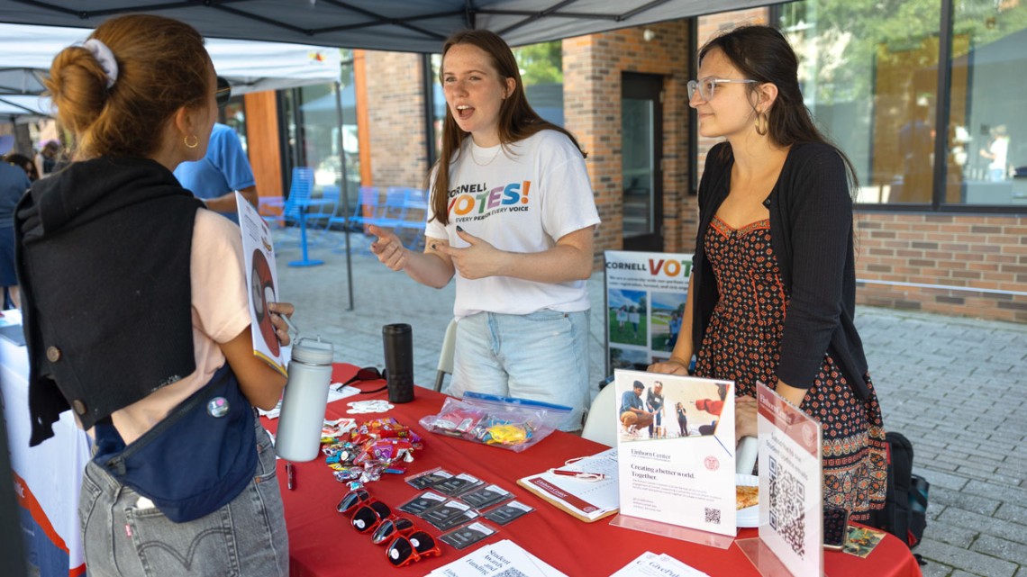 The nonpartisan student group Cornell Votes tables at Welcome Students Weekend, Sept. 14, on the Ithaca Commons.