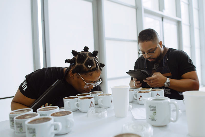 Nikisha and Matt testing coffee