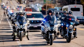 Hundreds of first responders line Chouteau Avenue as Ferguson Police Officer TJ Brown is transported to an out-of-state rehabilitation clinic on Tuesday, Nov. 12, 2024, in Midtown.