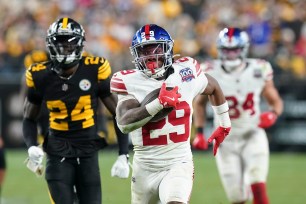 Giants running back Tyrone Tracy Jr. (29) runs against the Steelers on Oct. 28, 2024.