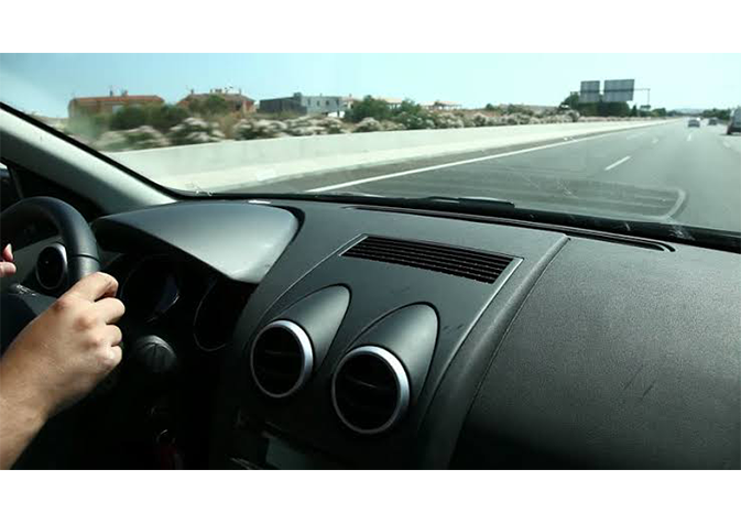 Car driving along the highway