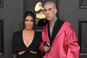 Kourtney Kardashian and Travis Barker attend the 64th Annual GRAMMY Awards