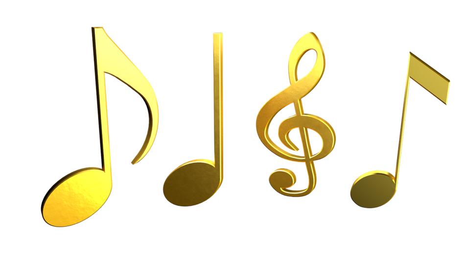 golden notes and treble clef on white background