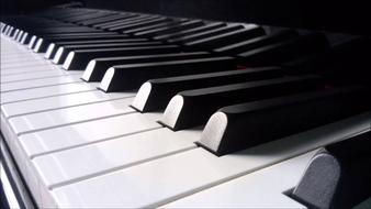 black and white piano keyboard close up