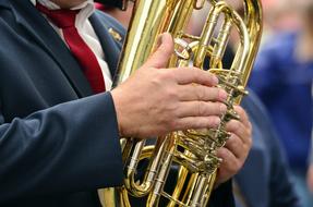 the hands of a musician on a musical instrument