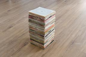 pile of vinyl records on the floor