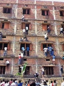 Parents Climb Up A Wall To Help Their Kids Cheat At School In India