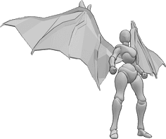 Pose Reference- Devil wings pose - Angry female with devil wings is standing with fisted hands and looking to the right