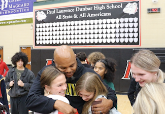 Devine Carama spent time with students after his presentation answering questions, taking photos and listening to their stories.