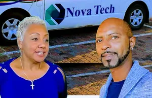 Cynthia and Eddy Petion, with a car behind them printed with the NovaTech branding