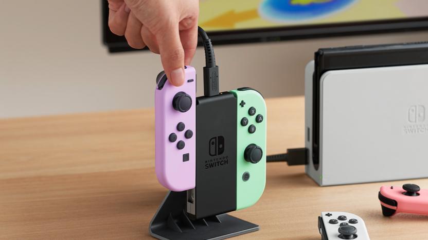 A charging station and controllers on a table.