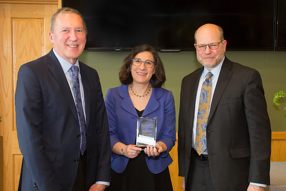 Cranor poses with Jon Caga, interim dead of the College of Engineering and Tom Mitchell, interim Dean of the School of Computer Science