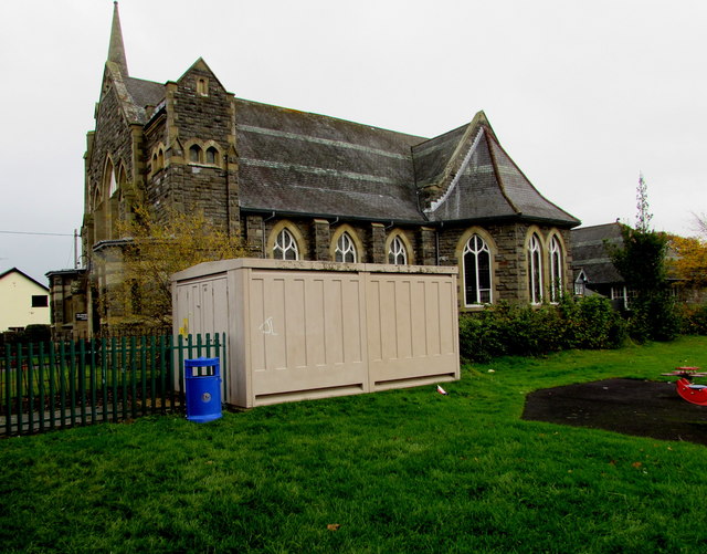 Electricity substation and church, Caersws