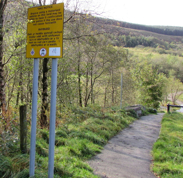 Yellow notice facing Howard Street in Clydach Vale Country Park