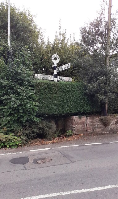 Cumberland County Council finger signpost on SW side of B6263