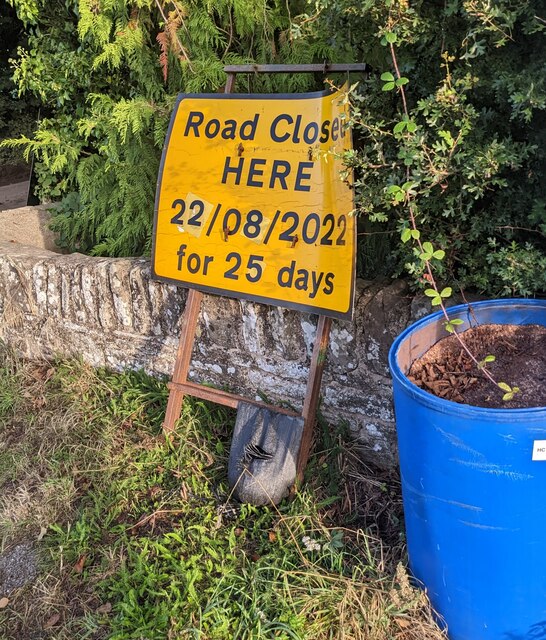 Yellow road closure sign, The Vineyard near Walterstone Common