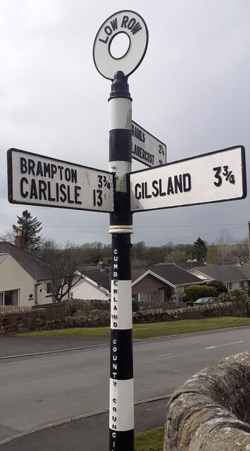 Cumberland County Council finger signpost at T-junction in Low Row