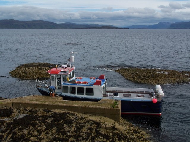 Ferry "Ullin of Staffa" alongside the landing stage on Staffa