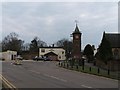 TL3990 : Doddington clock tower by Tony Bennett