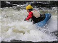 NH2701 : A kayaker playing on the river by Iain Robinson