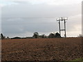  : Ploughed fields and pylons near Treble Sykes Farm. by Gordon Hatton