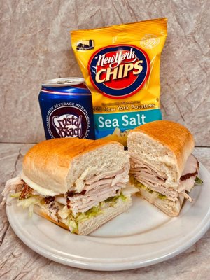 Photo of Java Country Store - North Java, NY, US. a sandwich and chips on a plate