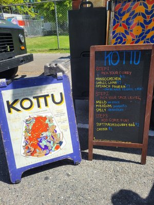 Photo of Kottu - Seattle, WA, US. Signage and menu