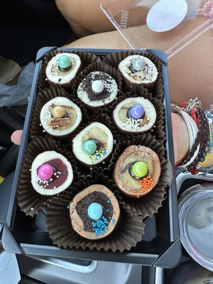 Photo of Cupcake Sushi - Key West, FL, US. a person holding a box of cupcakes