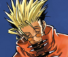 Vash the Stampede from Trigun Maximum. He's smiling, looking down with orange glasses, spiked up blonde hair, and a red coat that comes up to his face. It's a screenshot from the volume 6 cover.