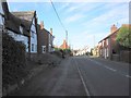 SK4723 : Main Street changes to West End at Smithy Lane by Gordon Murray