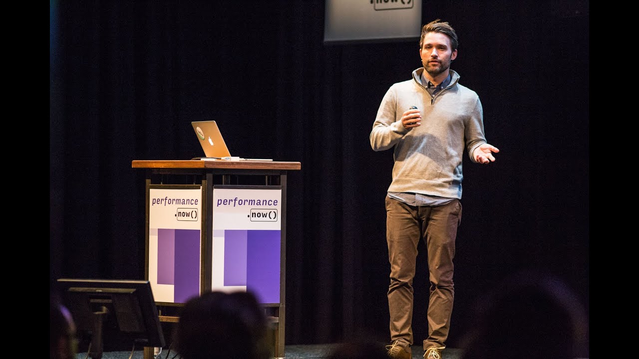 Scott on stage giving a talk