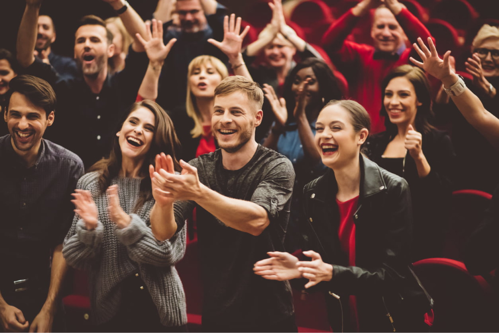 People cheering on event