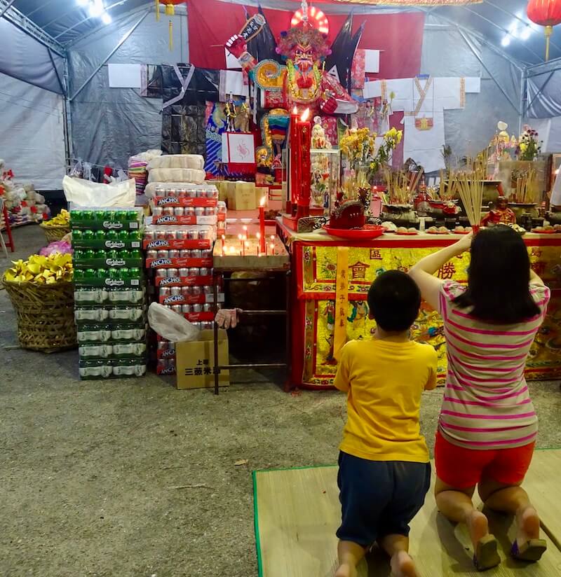 People praying during Hungry Ghost. Festivals of Malaysia