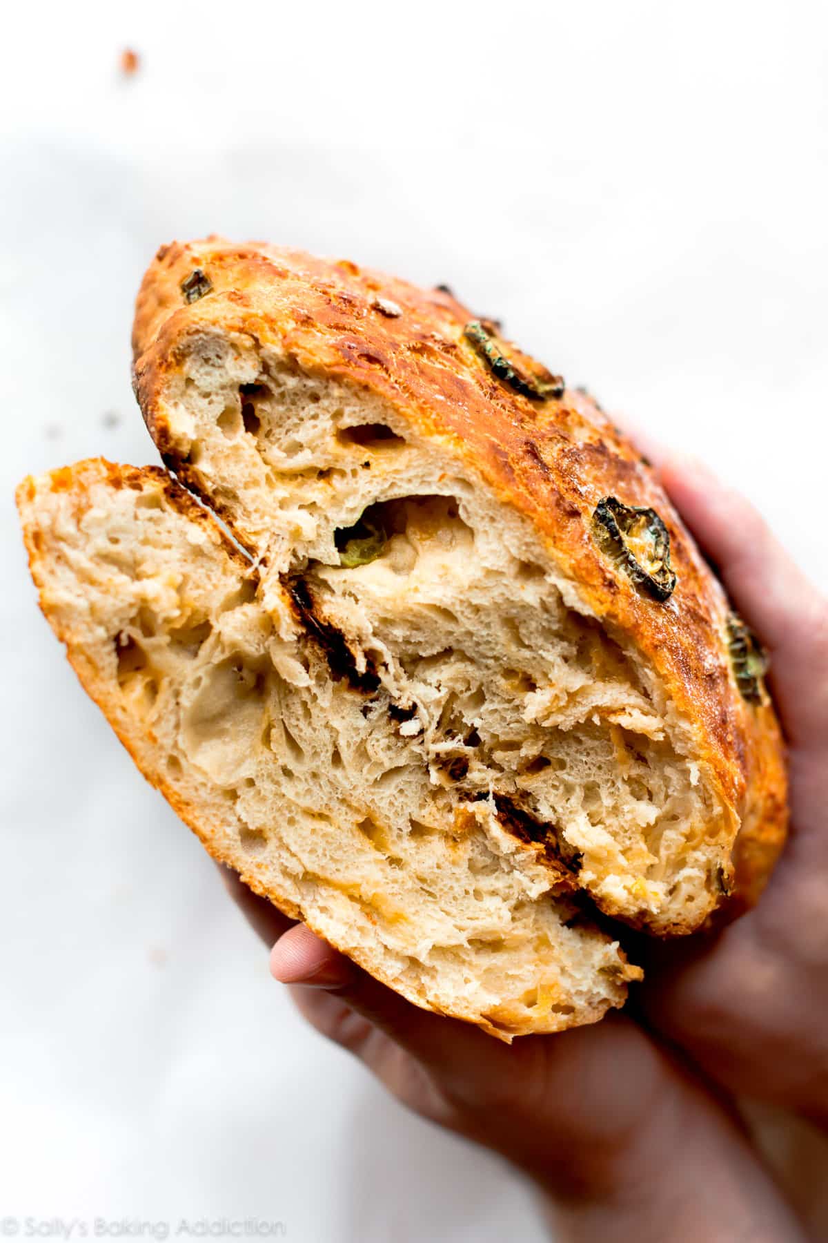 jalapeño cheddar bread broken in half