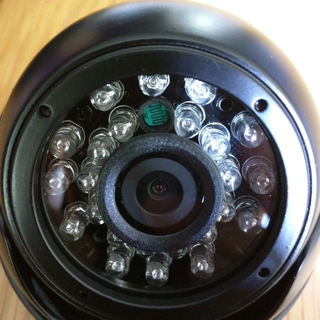 Close up on camera lens, sensor, and IR LEDs