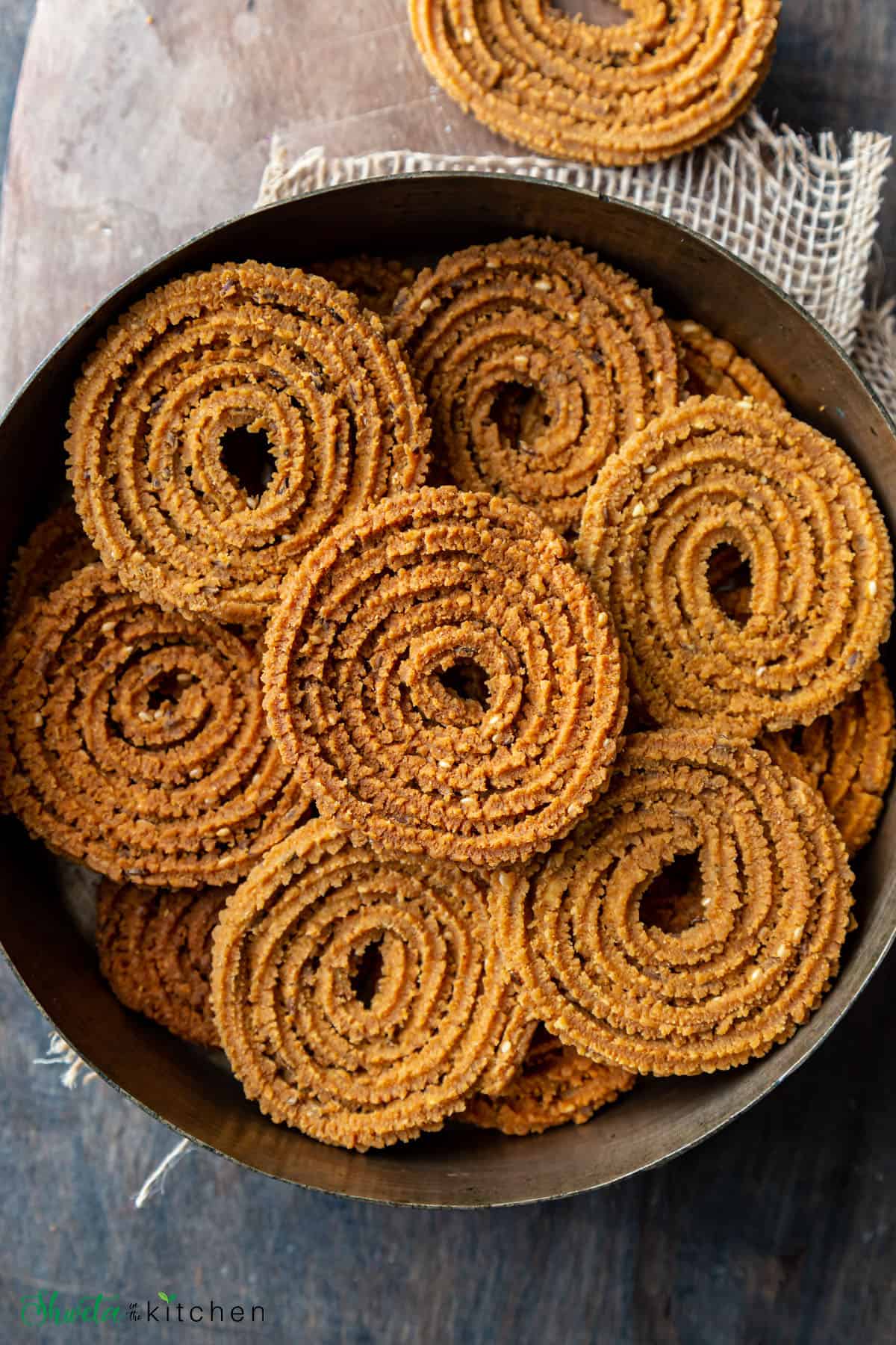 Chakli arranged on a circular plate