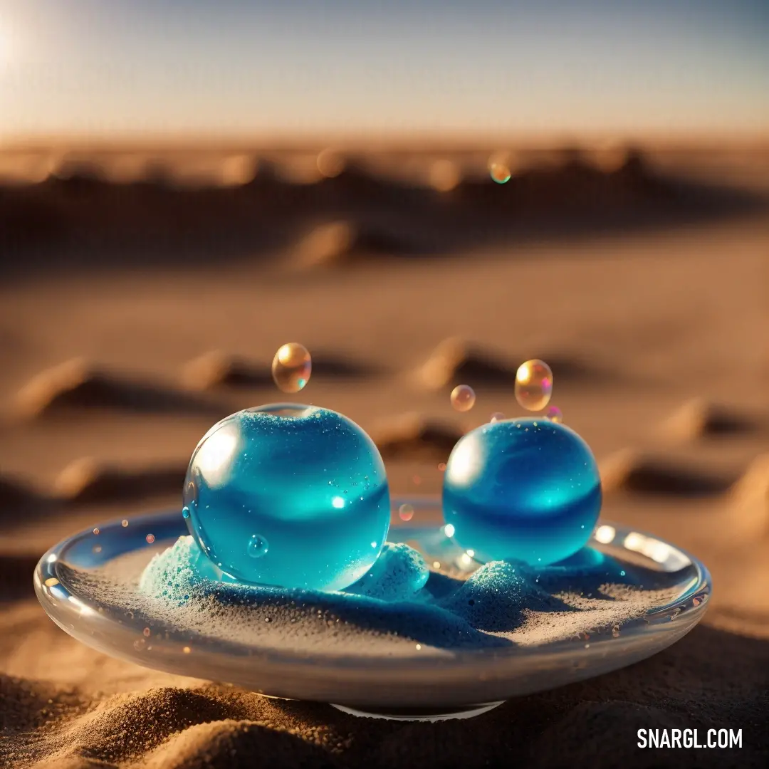 Two blue balls resting on a plate in the sand at the beach, with bubbles floating through the air and the sun casting warm light over the peaceful scene.