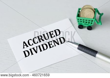 On The Business Card Is The Text Accrued Dividend