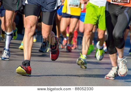 Marathon running race, runners feet on road