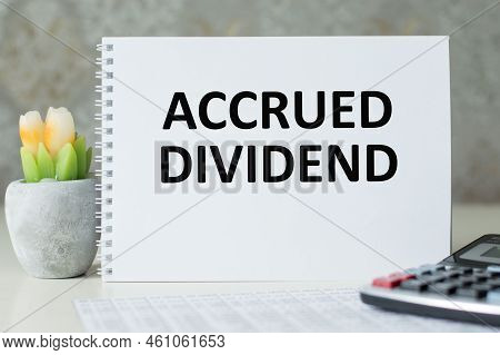 Accrued Dividend, Text On A Notepad On Table, Business Concept