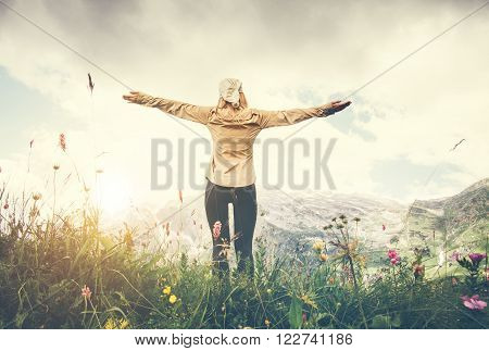 Woman Traveler hands raised hiking Travel Lifestyle concept Summer vacations outdoor mountains on background view from the ground