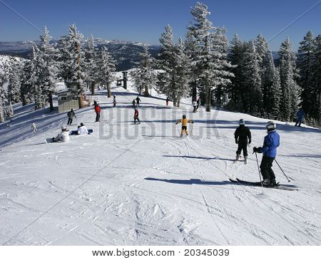 Skiers in busy ski resort