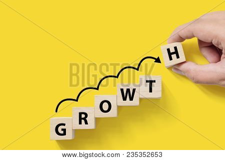 Business Success Growing Growth Increase Up Concept. Wooded Cube Block On White Background With Word