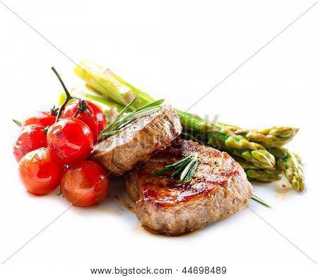 BBQ Steak. Barbecue Grilled Beef Steak Meat with Vegetables. Healthy Food. Barbeque Steak Dinner