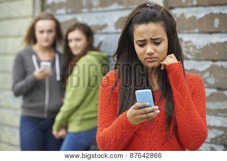 Teenage Girl Being Bullied By Text Message