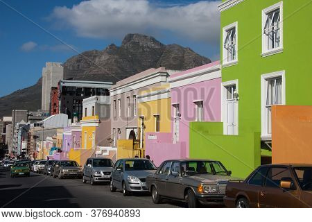 Bo-kaap, Cape Town, South Africa June 18 2012: colorful houses of the Bo-kaap district in Cape Town South Africa. Many tourists visit this neighborhood.