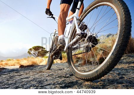 Extreme mountain bike sport athlete man riding outdoors lifestyle trail