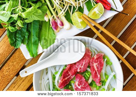 Top View Of The Pho Bo. Popular Beef Noodle Soup In Vietnam