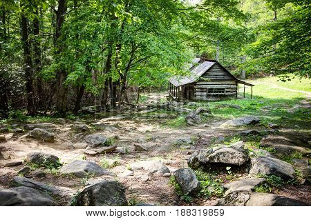 Pioneer Log Cabin. Log cabin in a lush mountain valley in the Great Smoky Mountains National Park. This cabin is a historical display in a national park not a privately owned property or residence