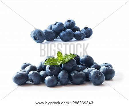 Heap Of Blueberry Fruits Isolated On White Background. Ripe Blueberries With Copy Space For Text. Bl